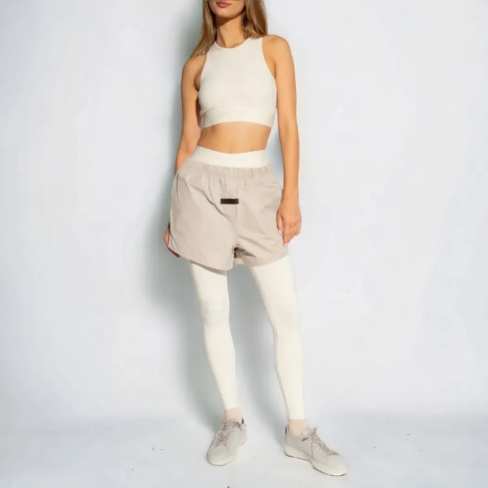 Fear of God Essentials Logo Sport Stretch Cotton Crop Tank in Eggshell Women's M - Picture 2 of 15